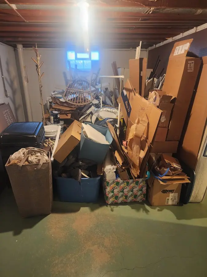 Roll-off dumpster container at job site for 2 Yard Dumpster Rental in Wareham